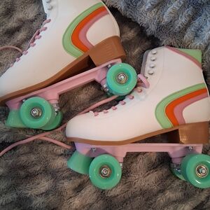 Vibrant Lace-Up Roller Skates with Green and Orange Accents